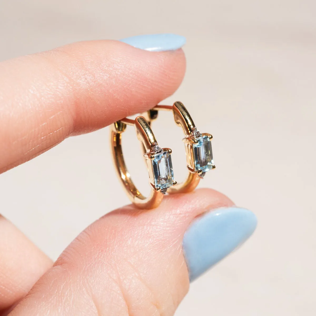 Solid Gold 2024 March Capsule Aquamarine Baguette Huggie Hoops